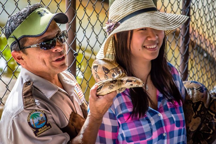 a person wearing sunglasses and a hat