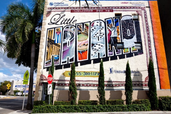 a stack of flyers on a city street