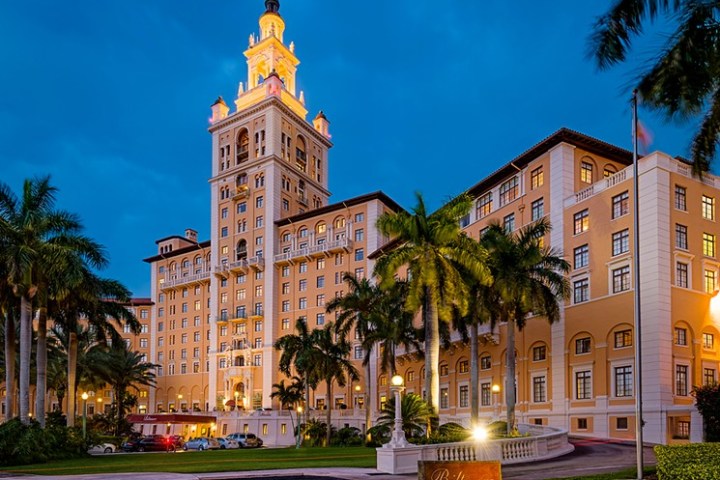 a clock tower lit up at night