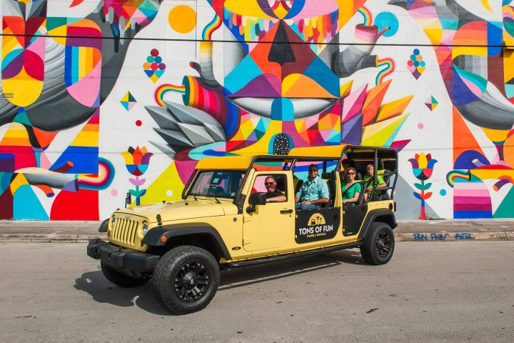 a colorful kite sitting on top of a truck