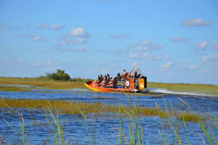 a small boat in a body of water